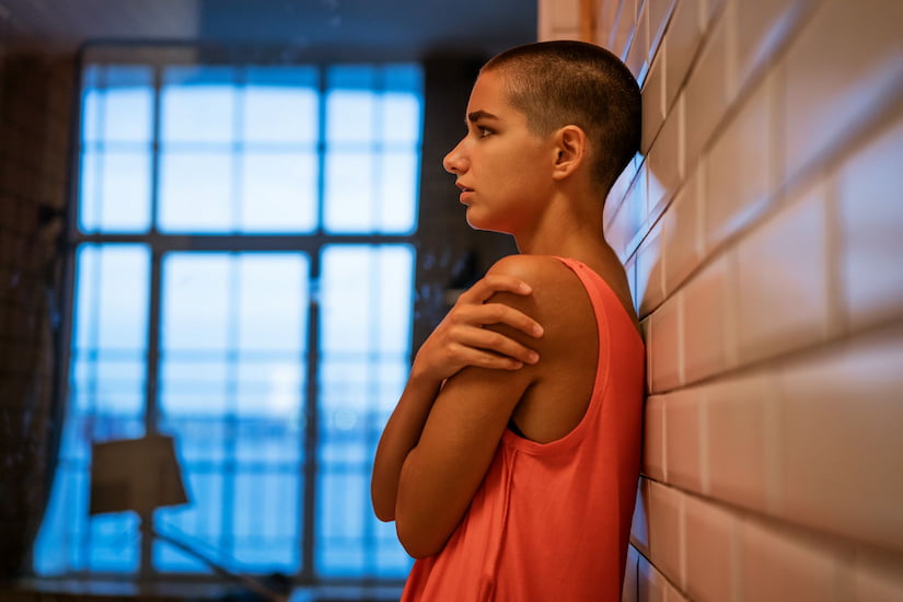 Girl trying to cope after cancer treatment