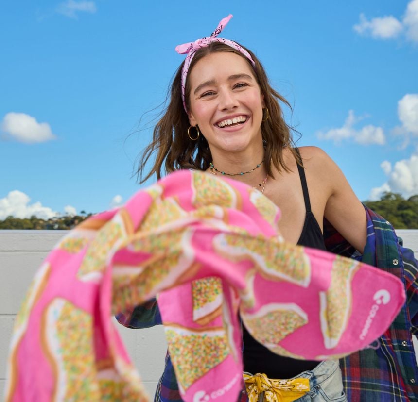 a young person with a canteen bandanna
