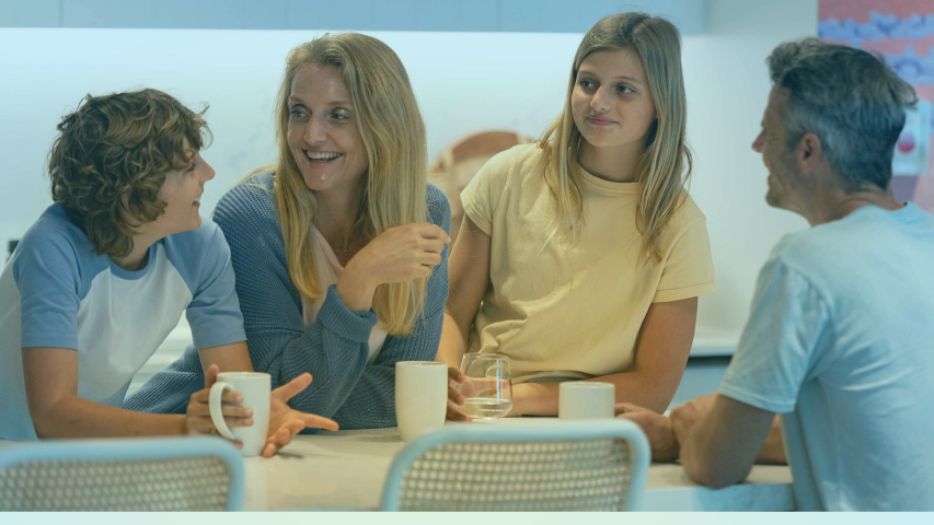 family talking in the kitchen